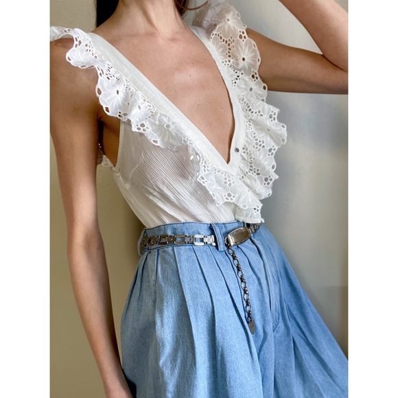 Tops - Plunging ruffle front bodysuit.